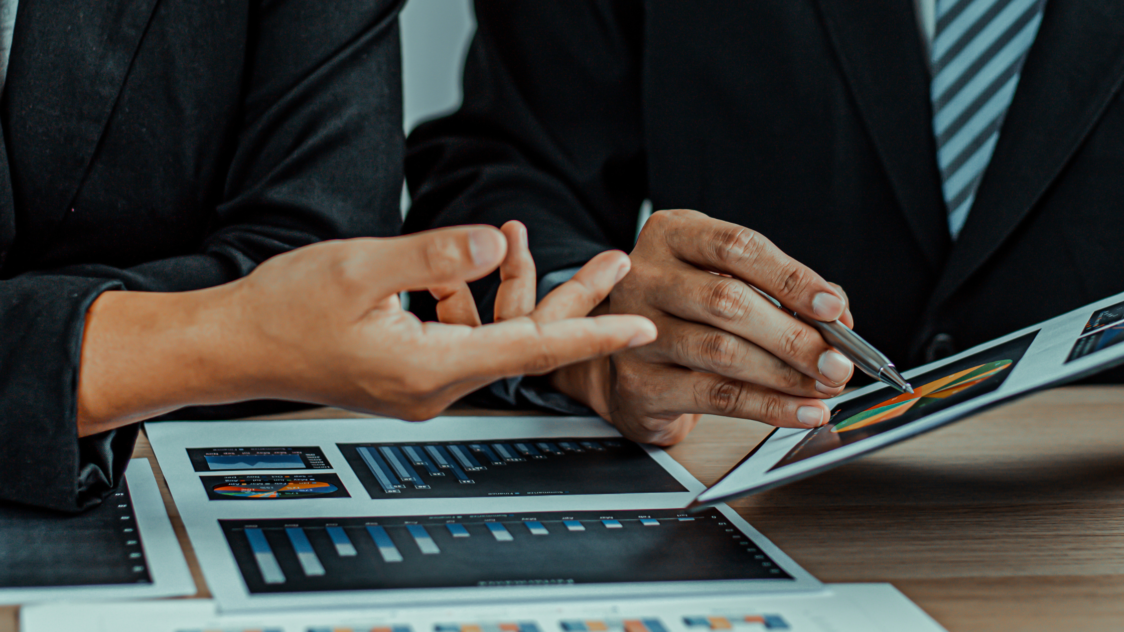 MSP growth in 2026: two business leaders reviewing performance charts and reports